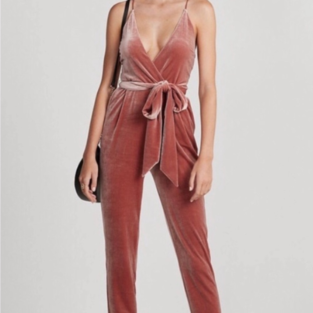 Express velvet pink jumpsuit. New with tags. Size 6.